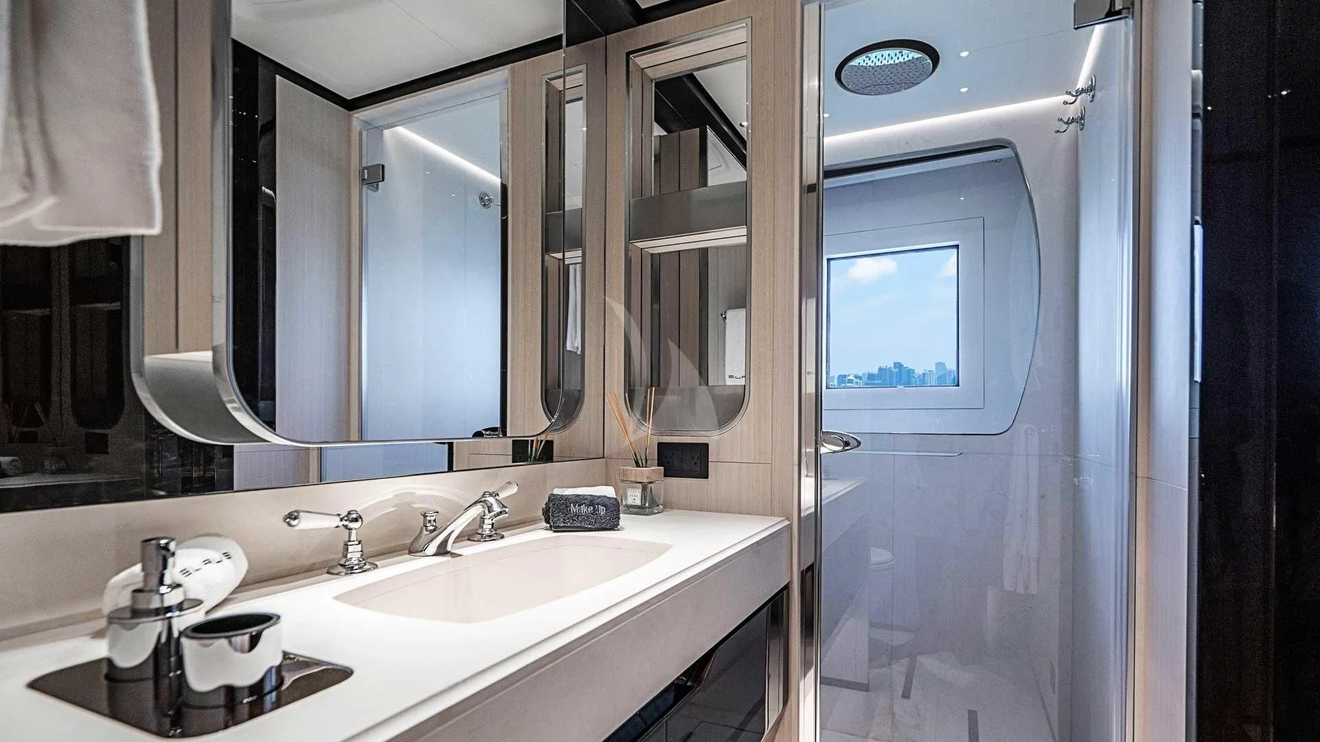a bathroom with a large mirror aboard BELLA VITA Yacht for Charter