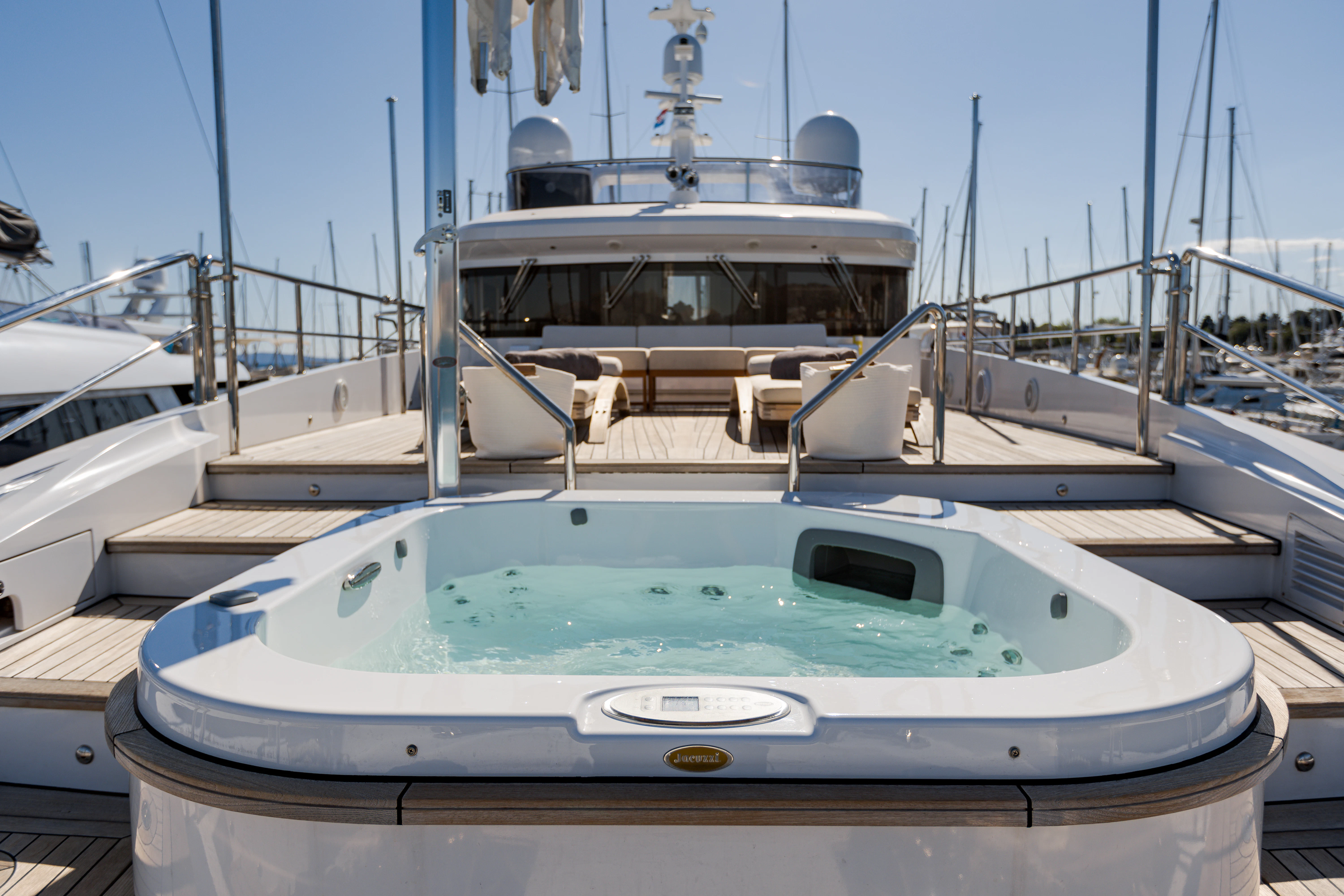 a boat parked in a harbor aboard BELLA VITA Yacht for Charter