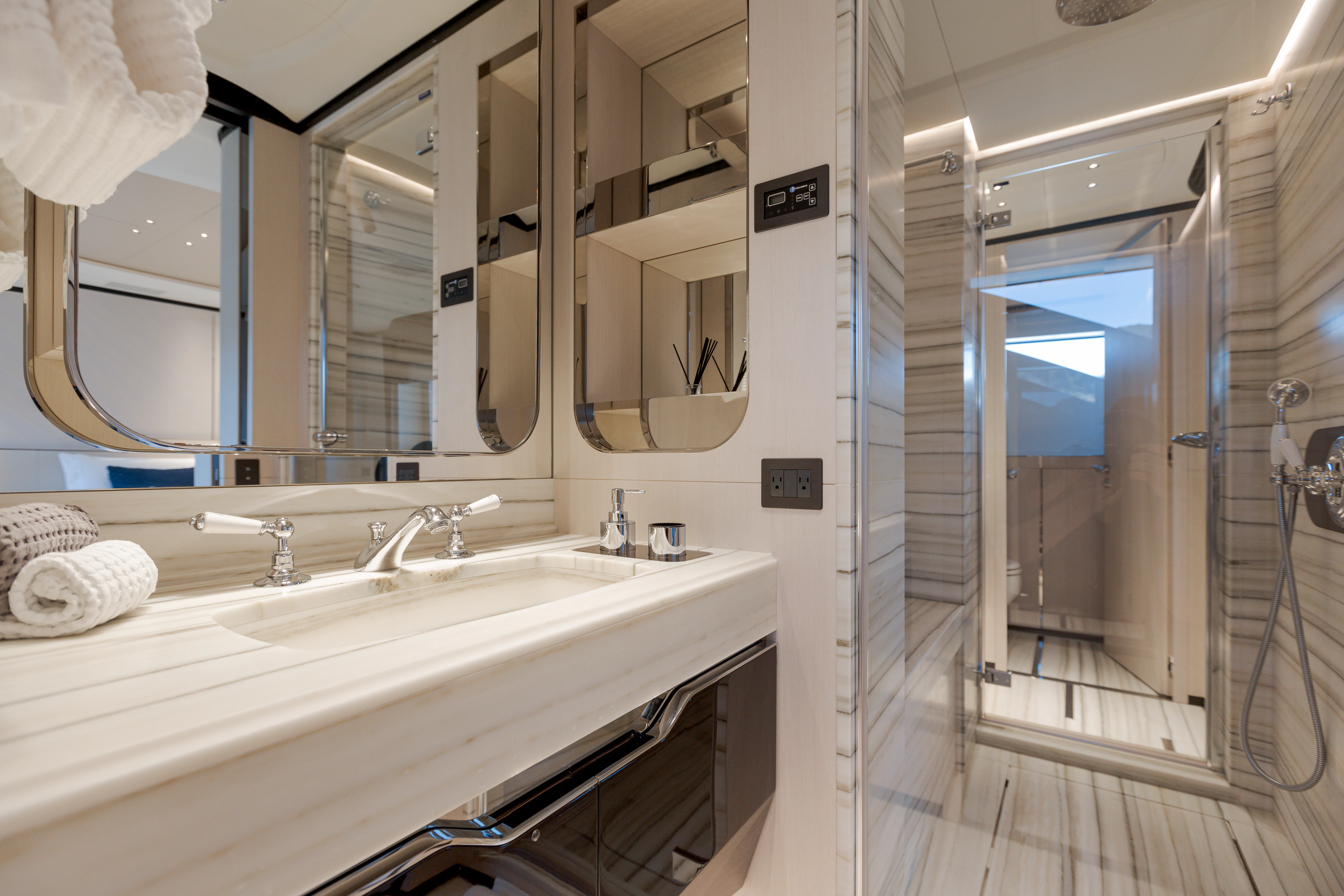 a bathroom with a large mirror aboard BELLA VITA Yacht for Charter