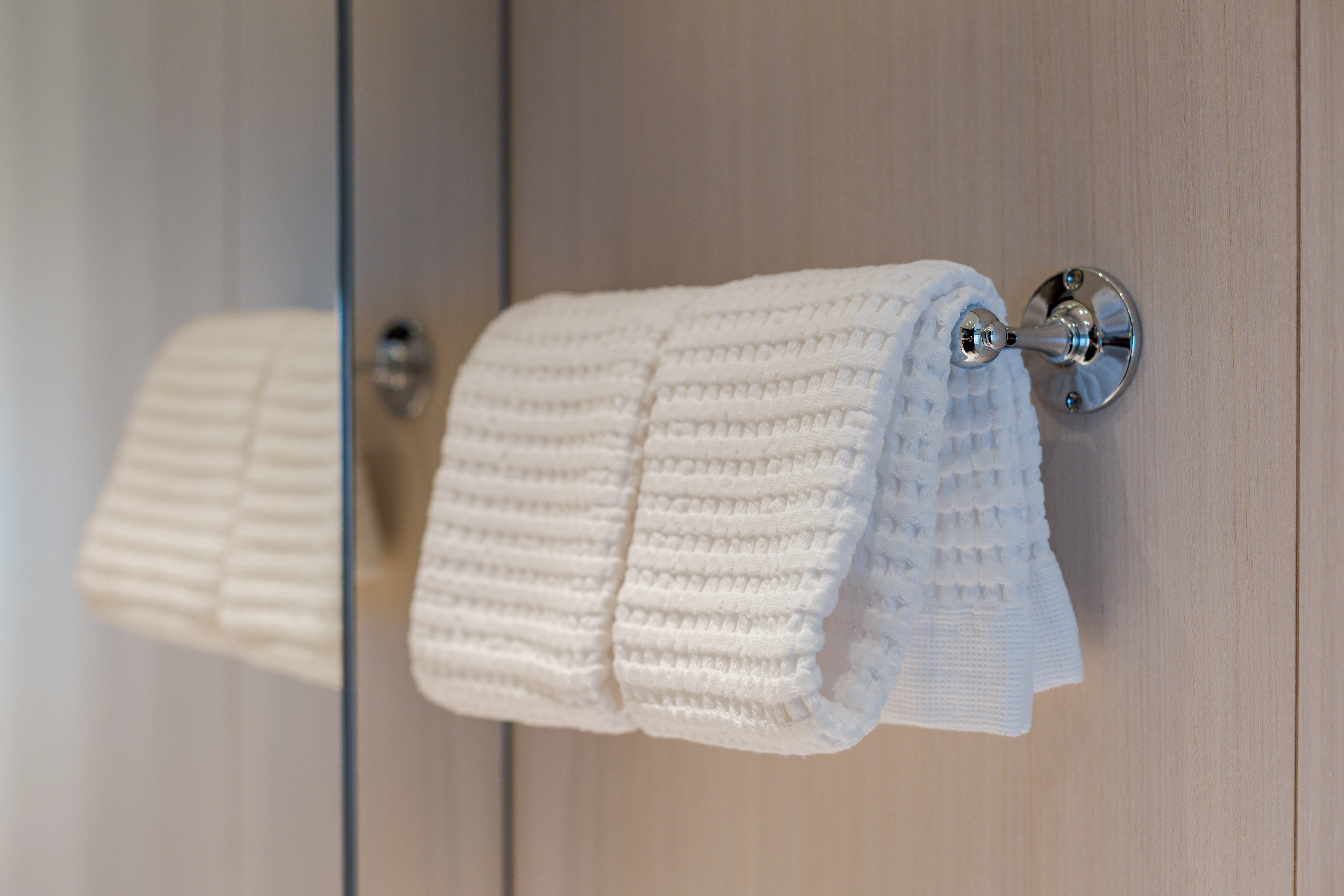 towels on a rack aboard BELLA VITA Yacht for Charter