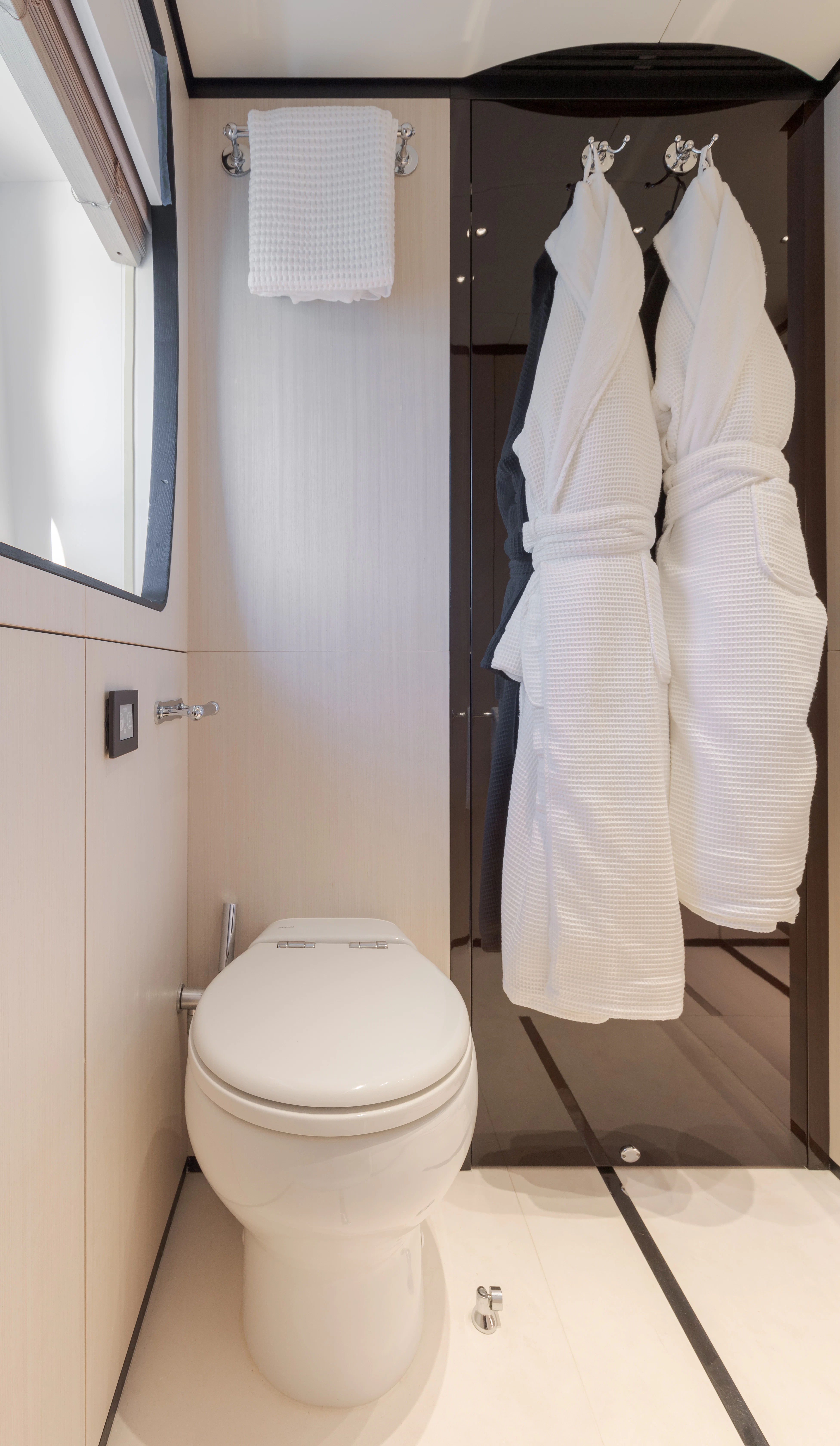 a white suit on a rack aboard BELLA VITA Yacht for Charter