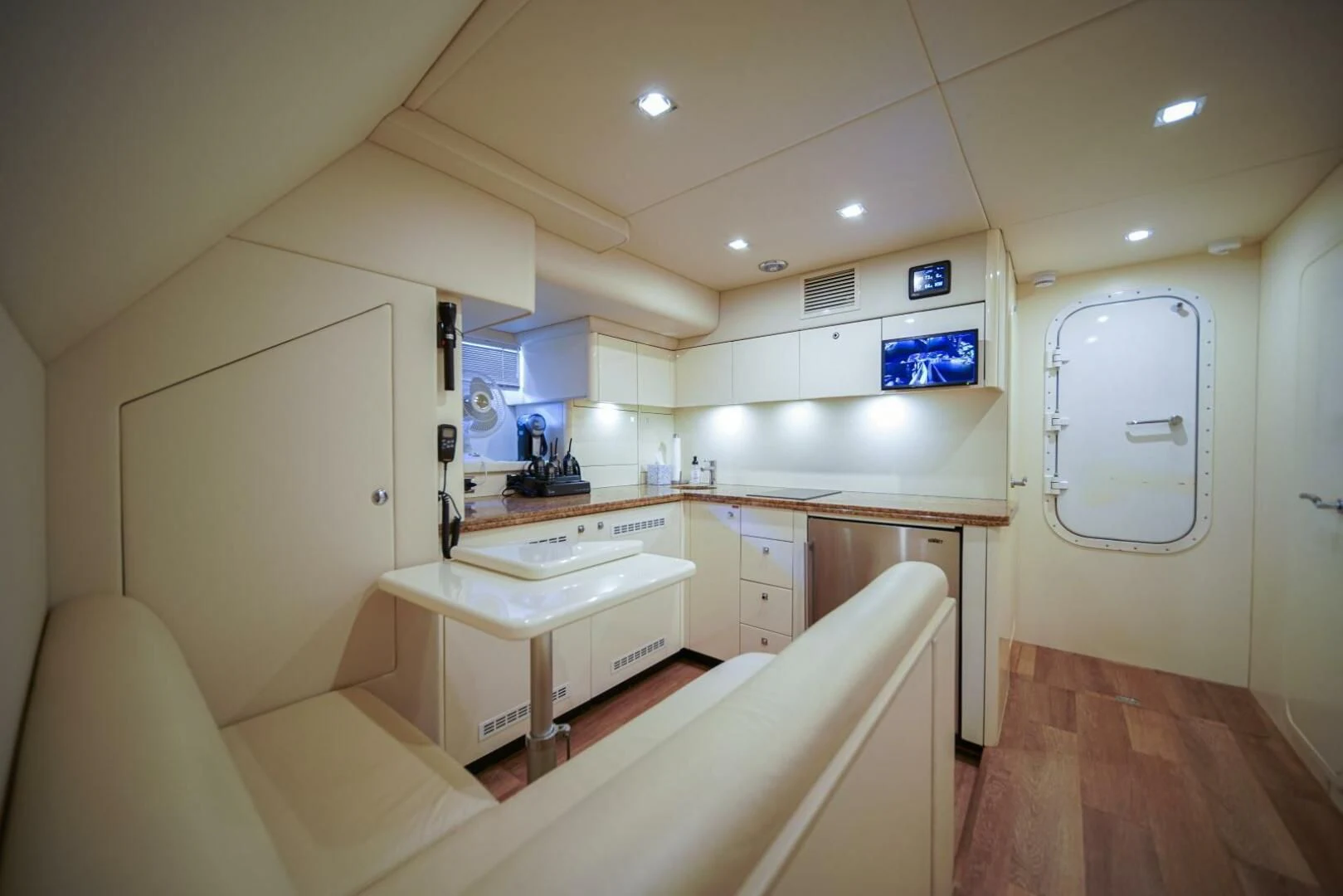 a kitchen with a sink and cabinets aboard EL TIO Yacht for Sale