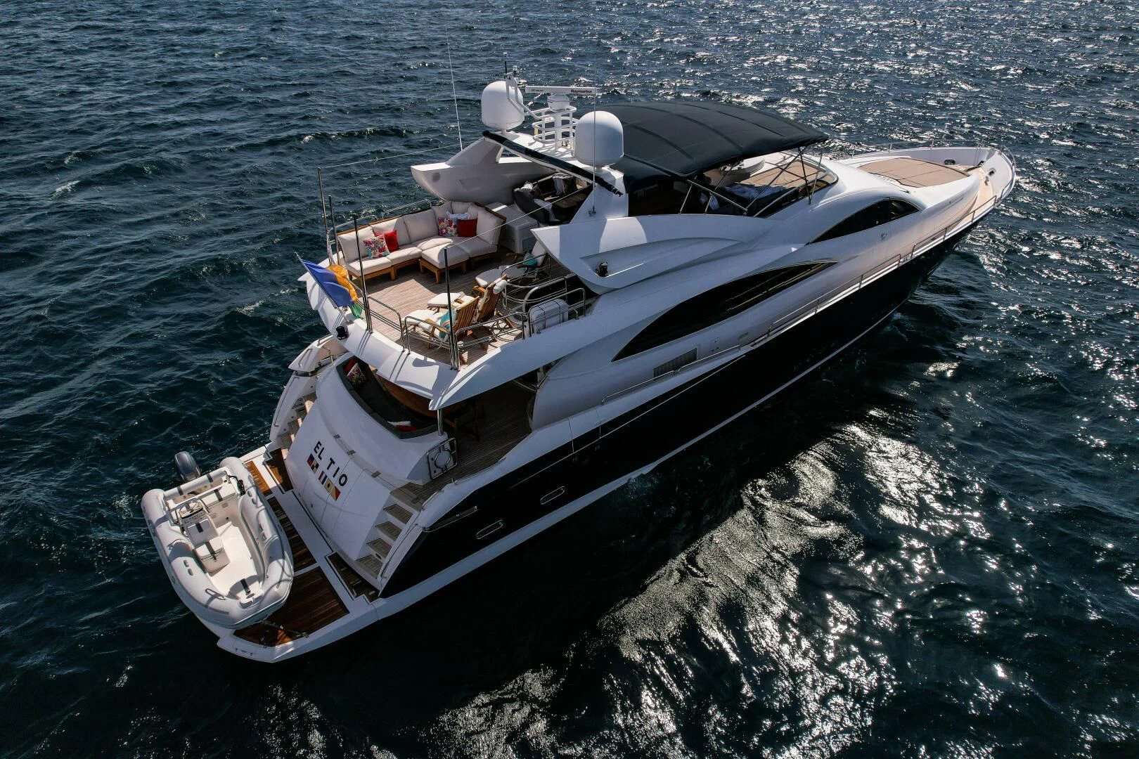 a military ship in the water aboard EL TIO Yacht for Sale
