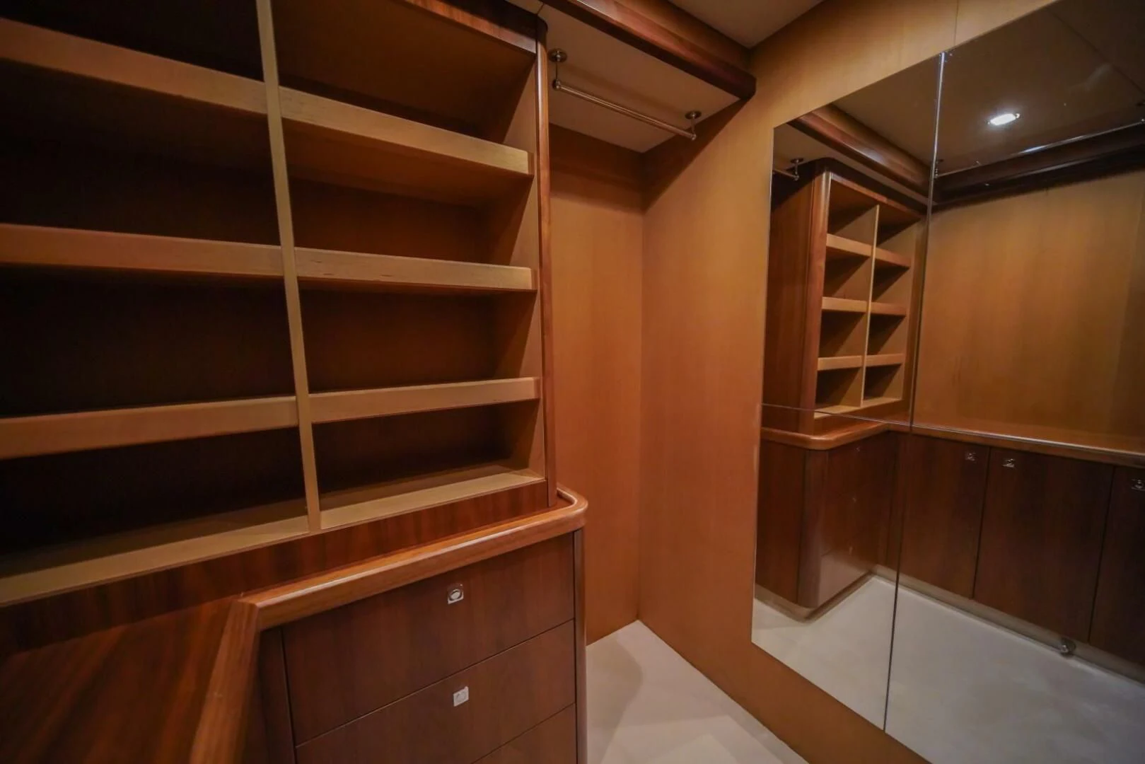a wooden shelf in a room aboard EL TIO Yacht for Sale