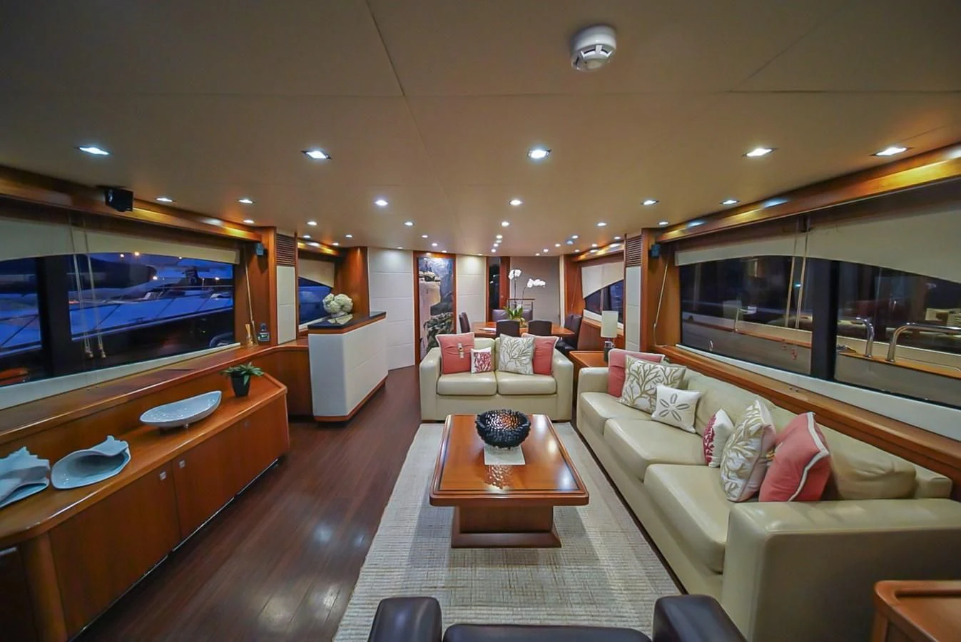 a living room with a large screen aboard EL TIO Yacht for Sale