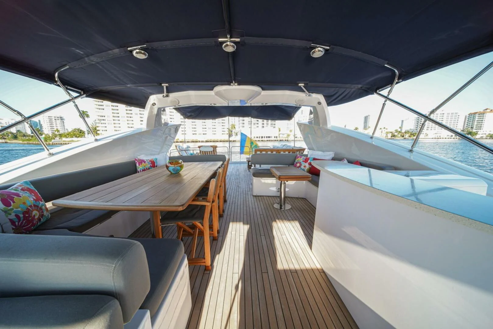 a deck with a deck and chairs aboard EL TIO Yacht for Sale