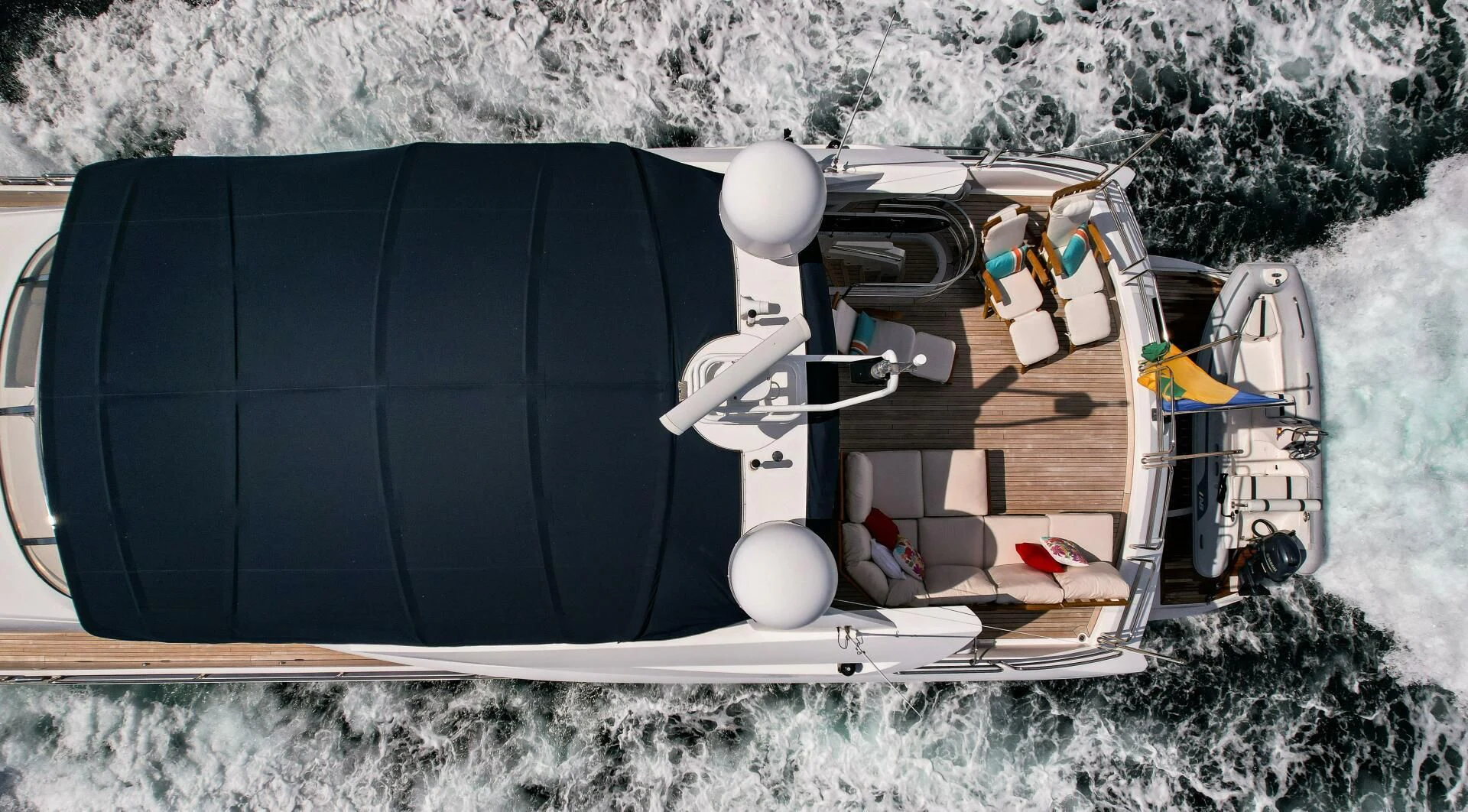 a black van with a white hood aboard EL TIO Yacht for Sale