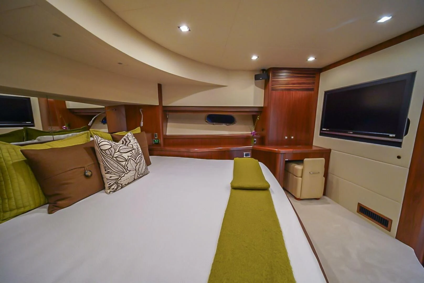 a room with a bed and a tv aboard EL TIO Yacht for Sale