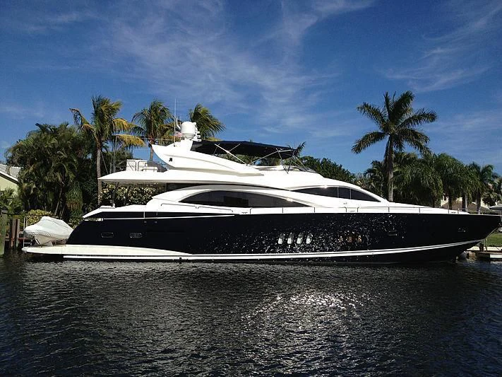 a white yacht on the water aboard EL TIO Yacht for Sale