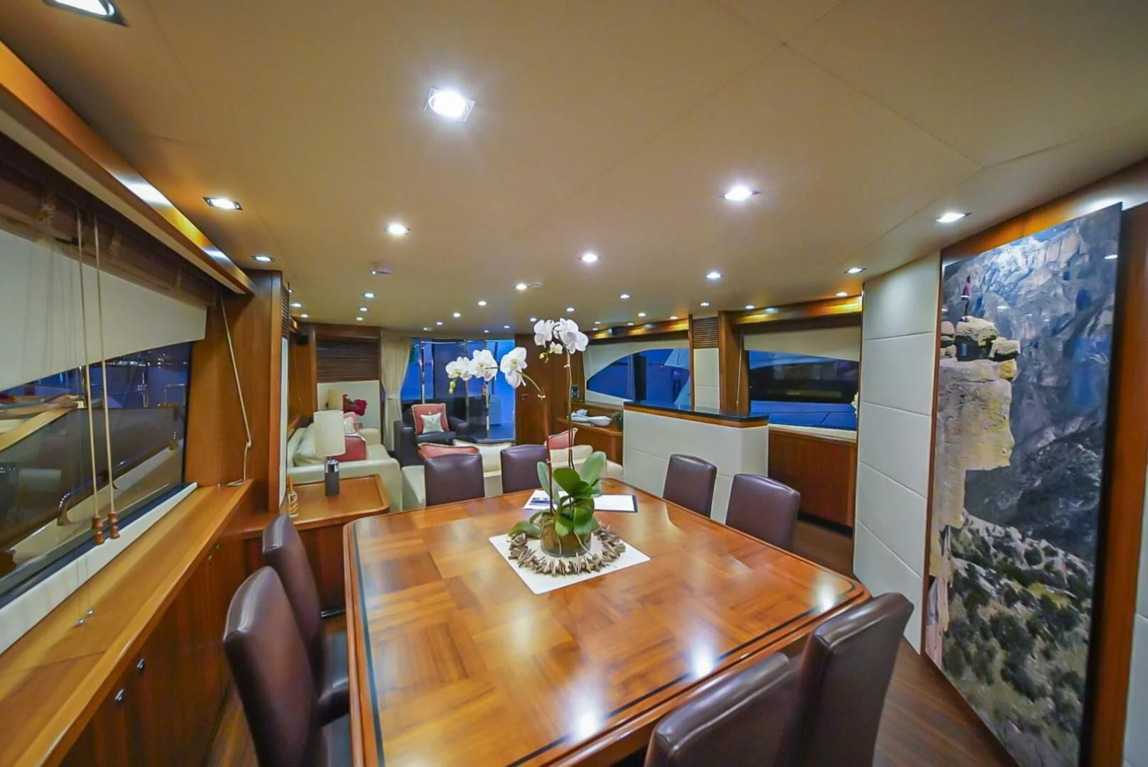a dining room with a table and chairs aboard EL TIO Yacht for Sale