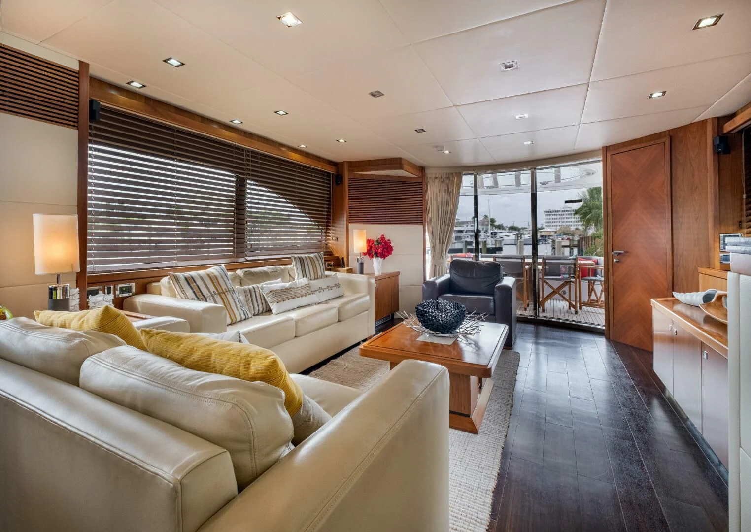a living room with a large window aboard EL TIO Yacht for Sale