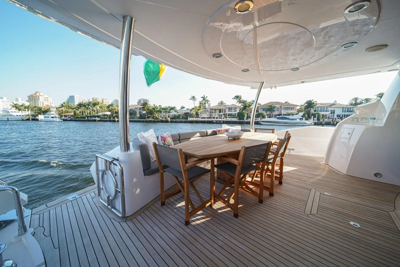 a table on a deck aboard EL TIO Yacht for Sale