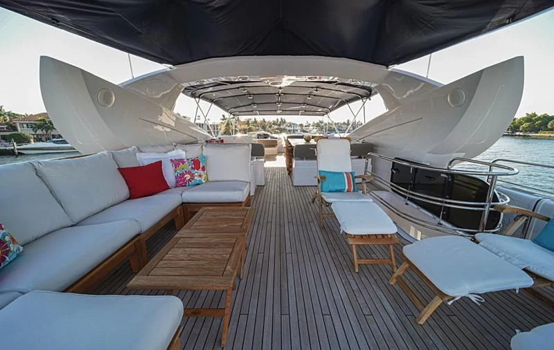 a boat on a deck aboard EL TIO Yacht for Sale