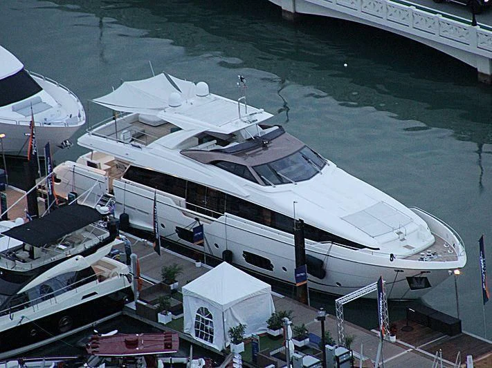 a large cruise ship docked aboard CLUB M Yacht for Sale
