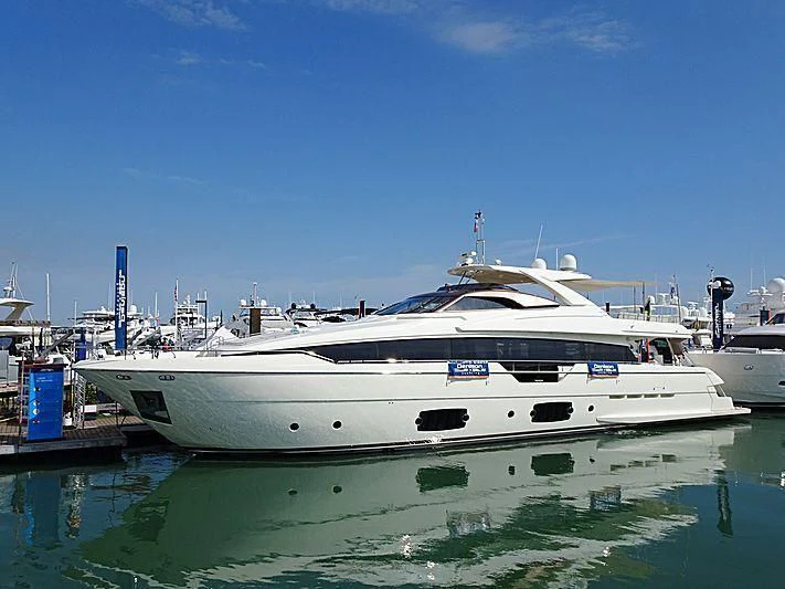 a couple of boats are parked in a harbor aboard CLUB M Yacht for Sale