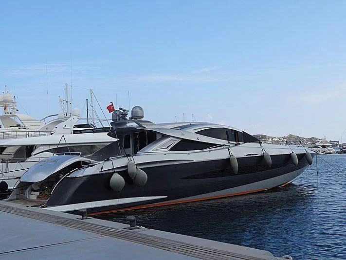 a boat docked at a pier aboard SLICE OF LIFE Yacht for Sale