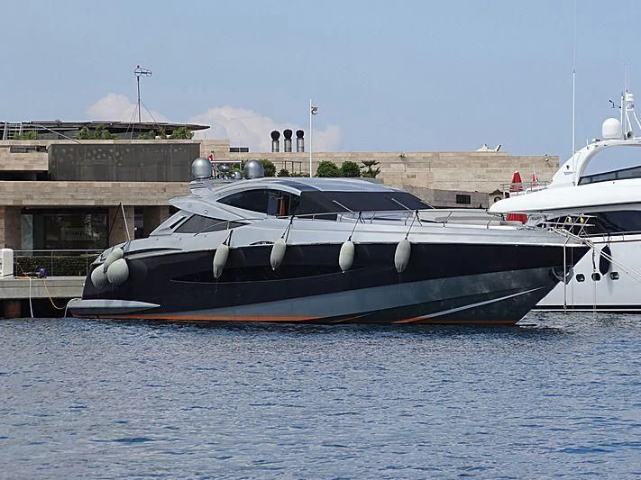 a boat docked at a pier aboard SLICE OF LIFE Yacht for Sale