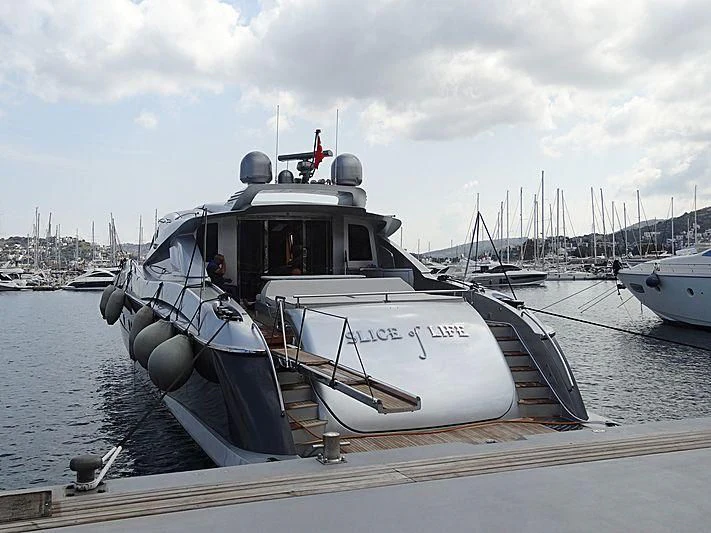 a boat docked at a pier aboard SLICE OF LIFE Yacht for Sale