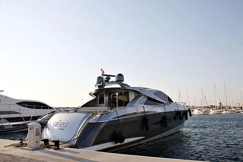 a boat docked at a pier aboard SLICE OF LIFE Yacht for Sale