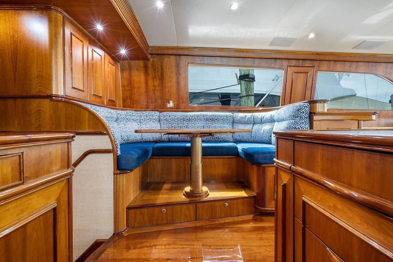 a room with wooden cabinets aboard PAST TIME Yacht for Sale