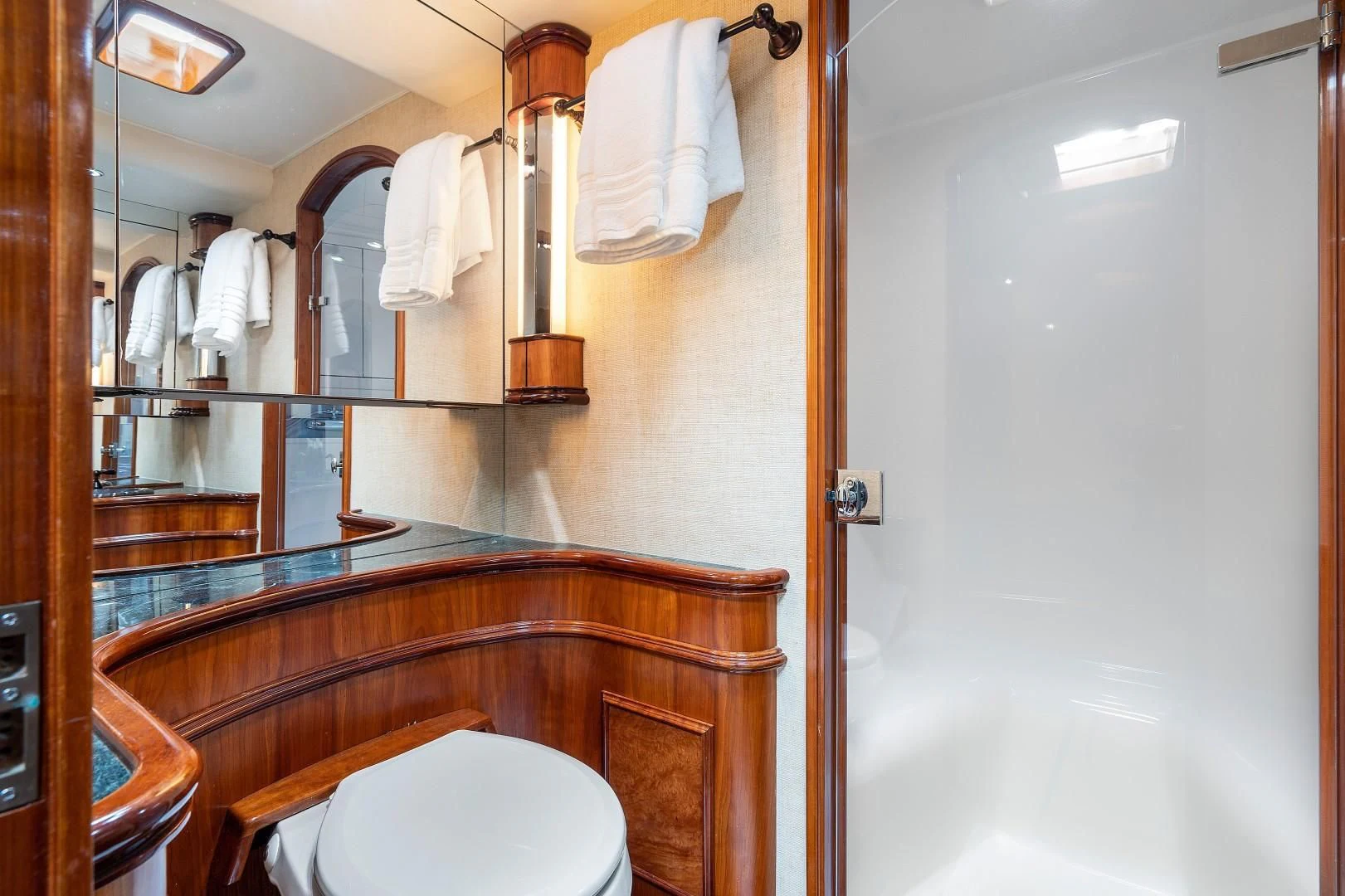 a bathroom with a sink and toilet aboard PAST TIME Yacht for Sale