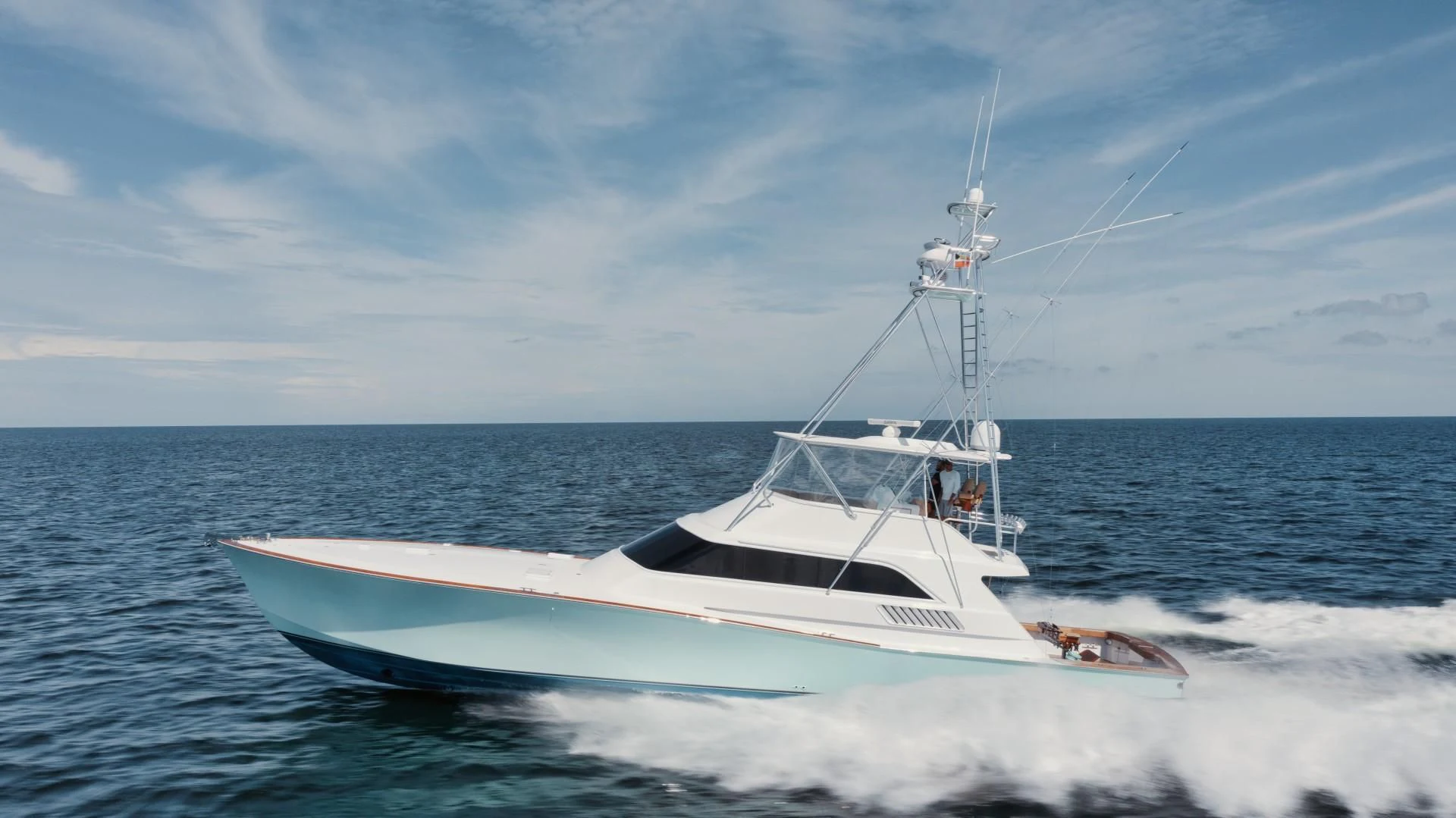 a white boat on the water aboard PAST TIME Yacht for Sale