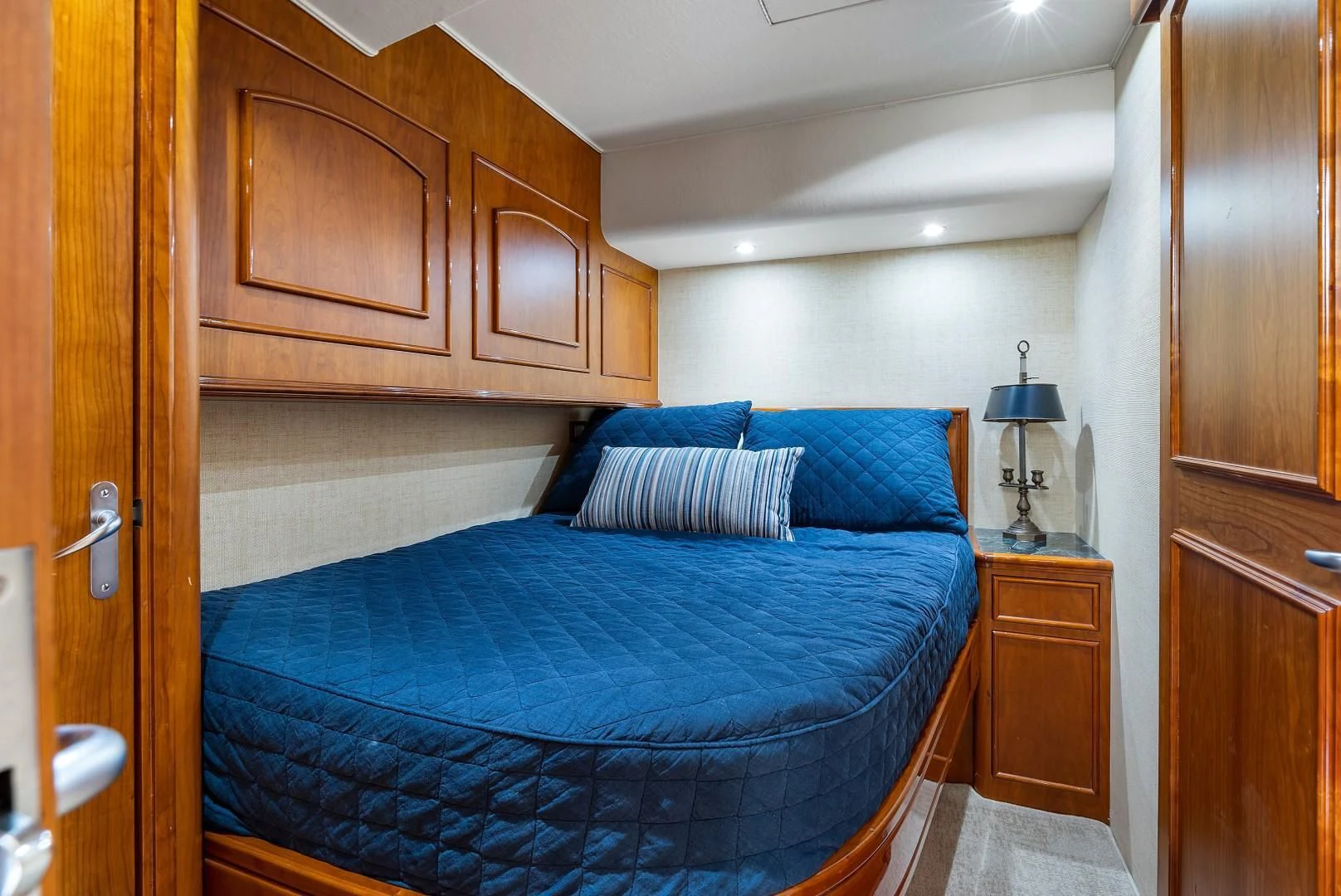 a bed in a room aboard PAST TIME Yacht for Sale