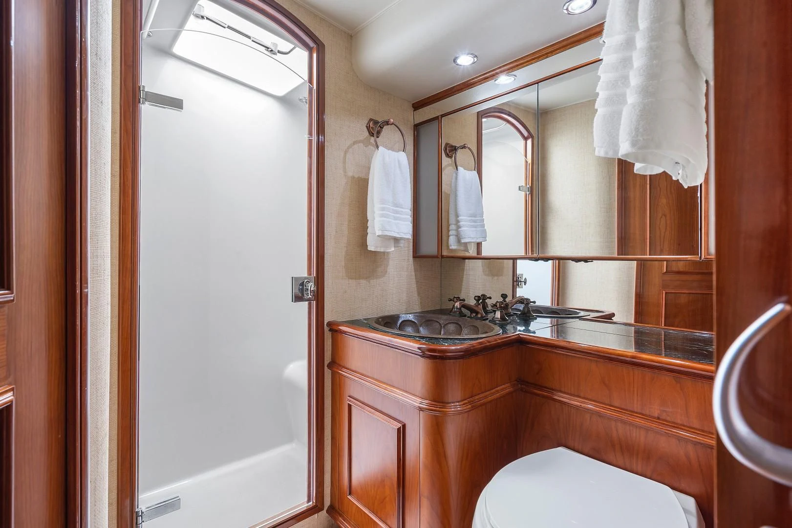 a bathroom with a sink and a toilet aboard PAST TIME Yacht for Sale