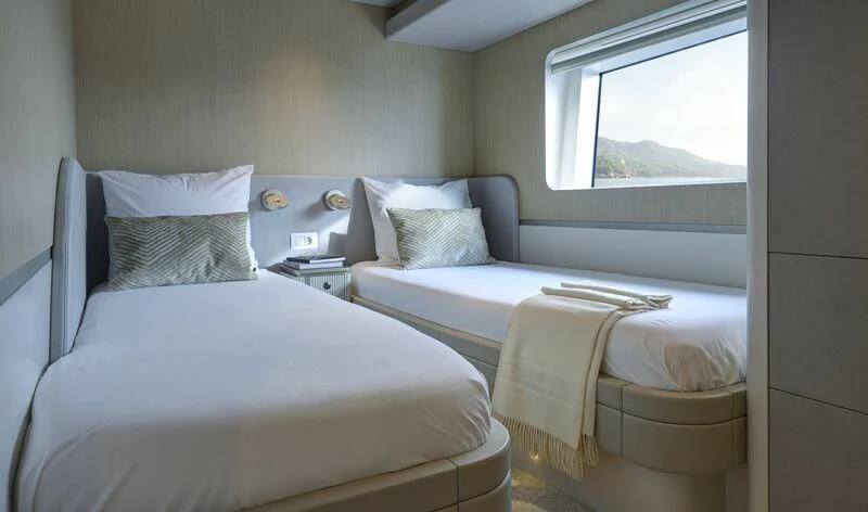 a couple of beds in a room aboard DUTCH FALCON Yacht for Sale