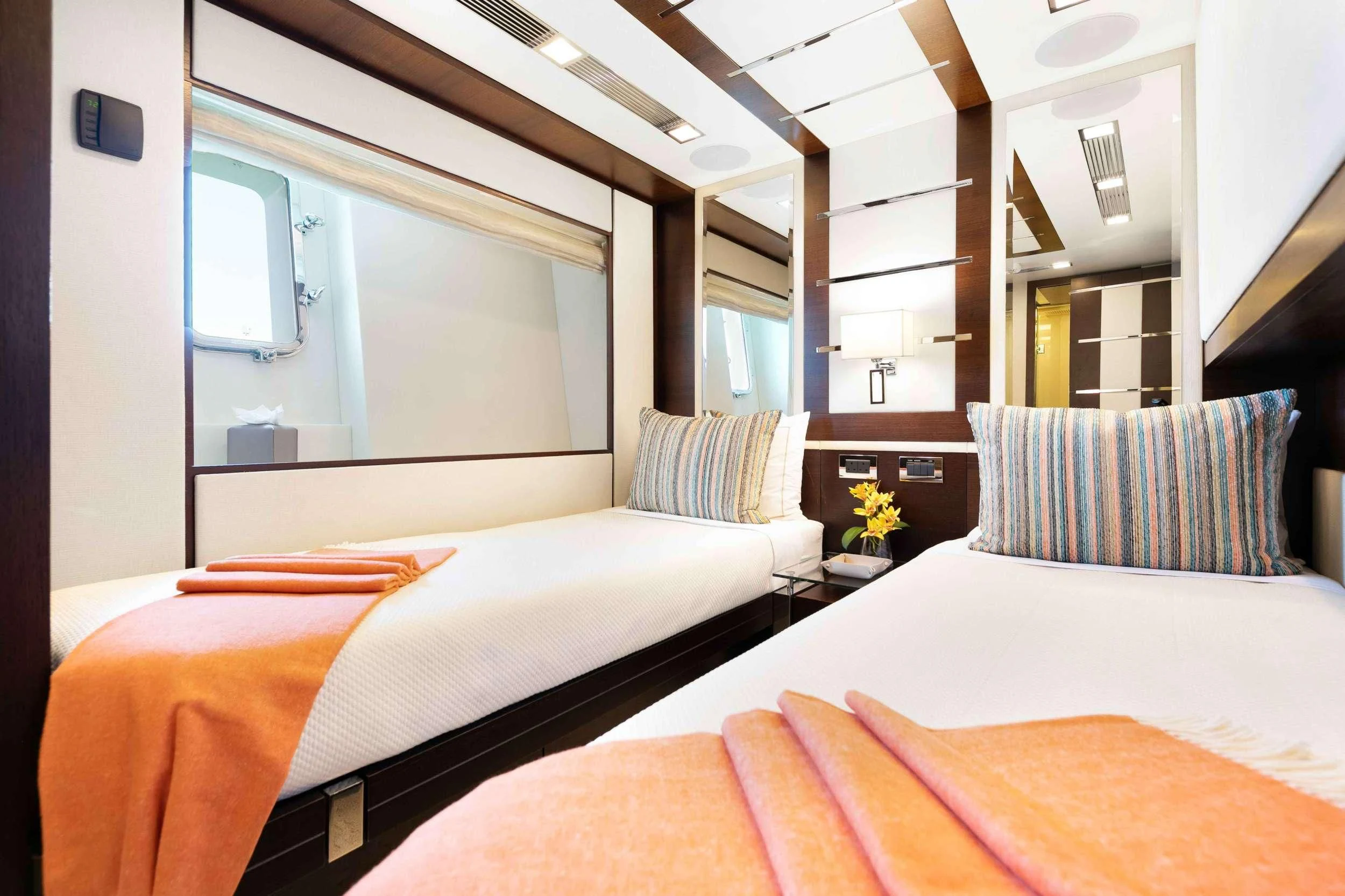 a room with two beds aboard INSIEME Yacht for Sale