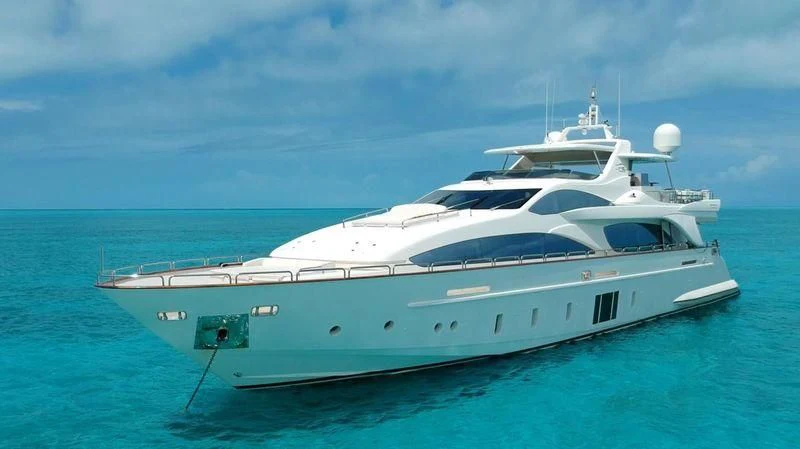 a white yacht in the water aboard INSIEME Yacht for Sale