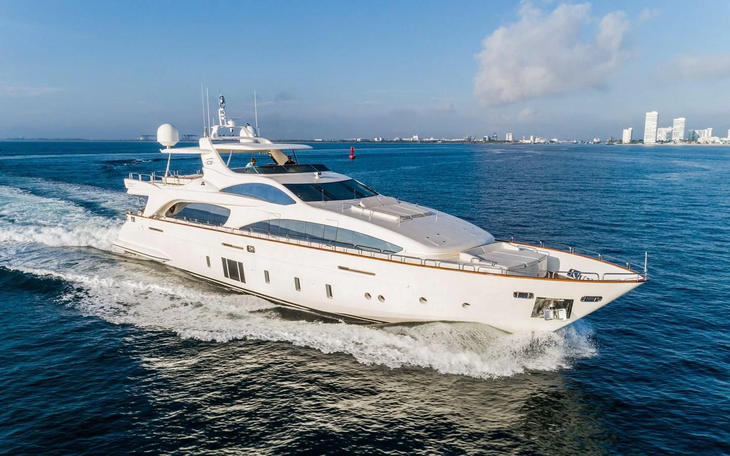 a white yacht on the water aboard INSIEME Yacht for Sale