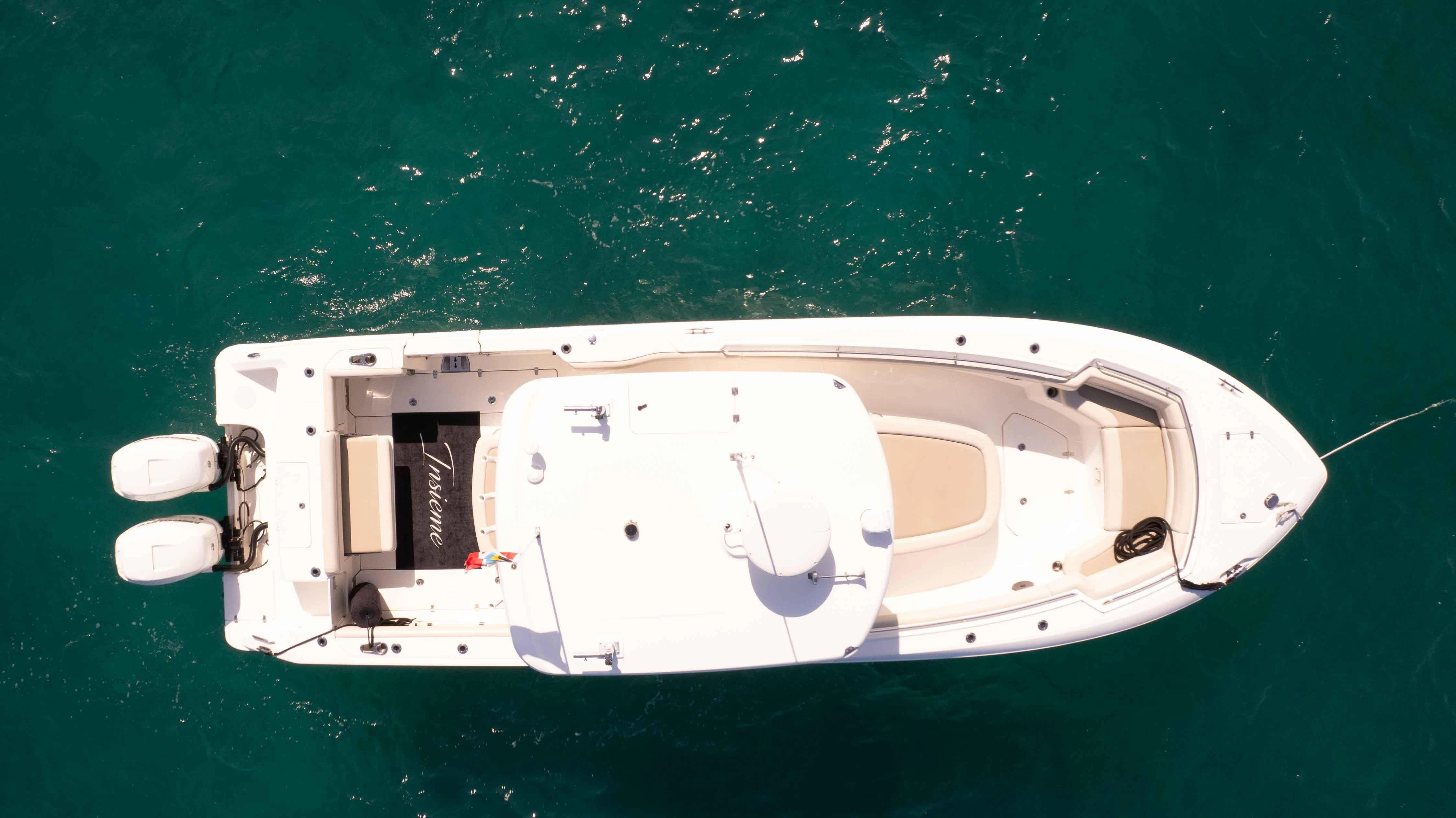 a white computer with a black background aboard INSIEME Yacht for Sale
