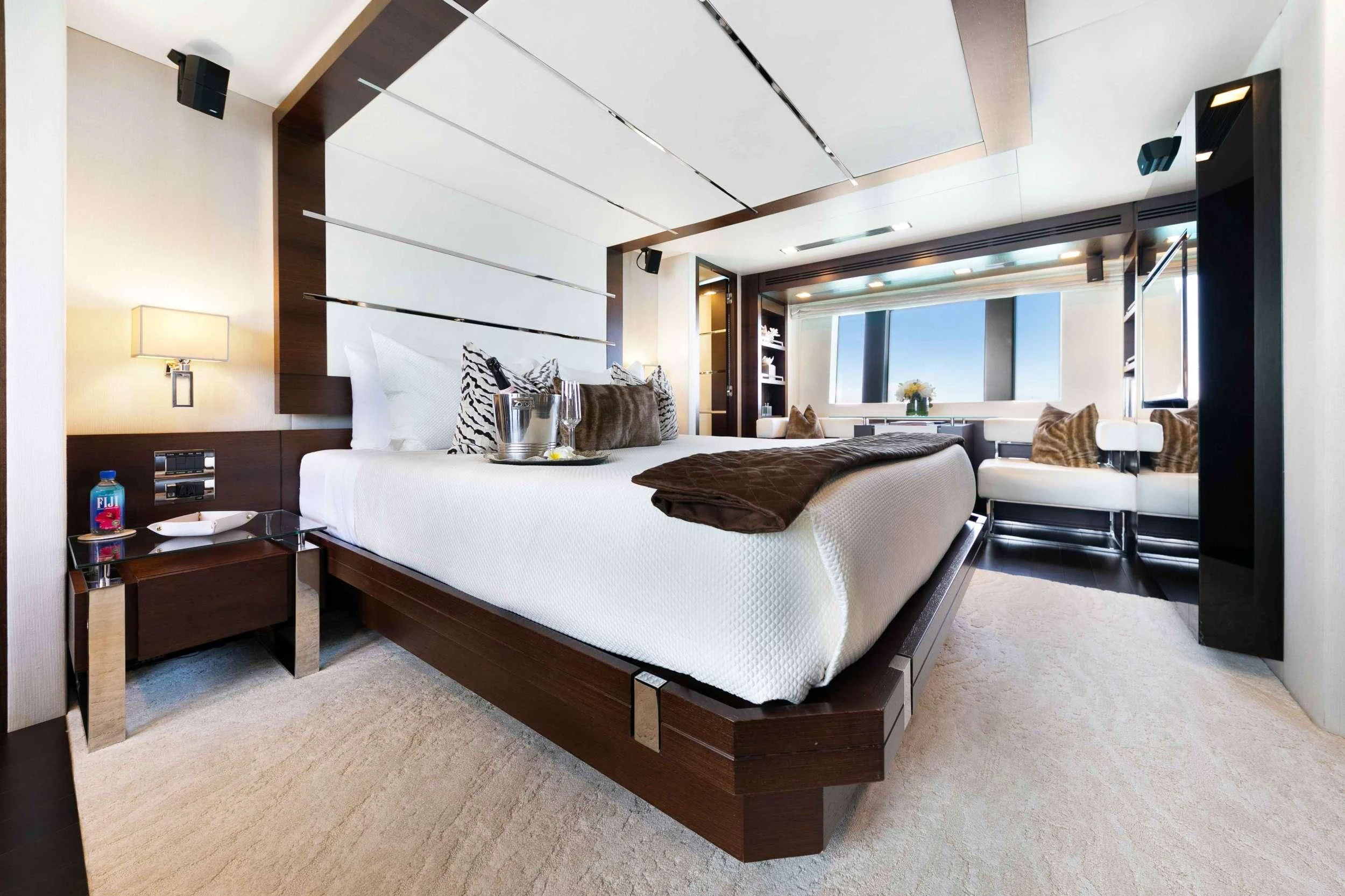 a large bed in a room aboard INSIEME Yacht for Sale