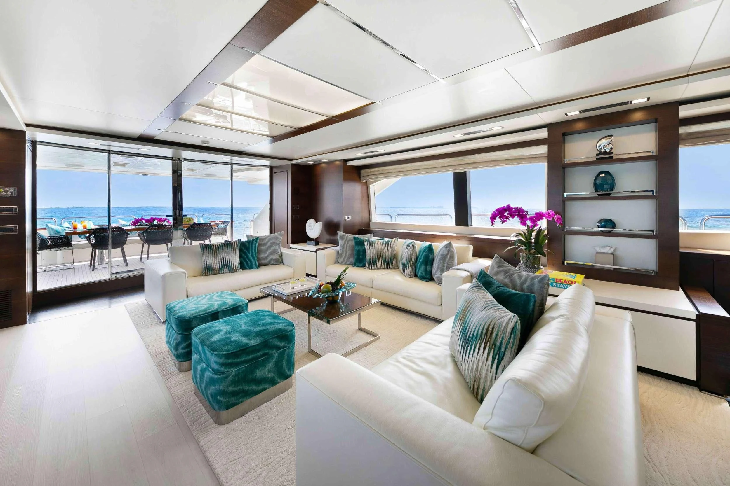 a living room with a large window aboard INSIEME Yacht for Sale