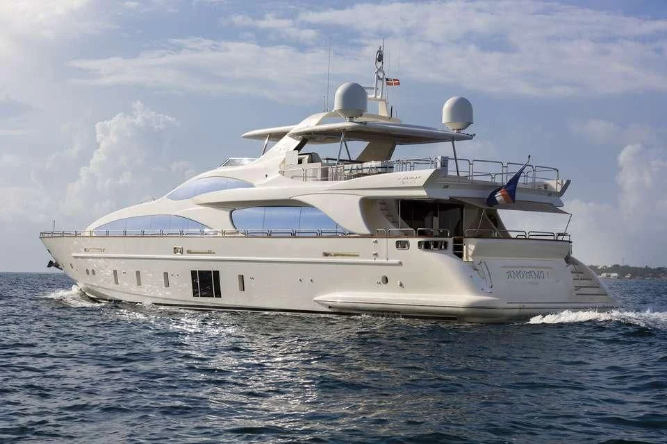 a white yacht in the water aboard INSIEME Yacht for Sale
