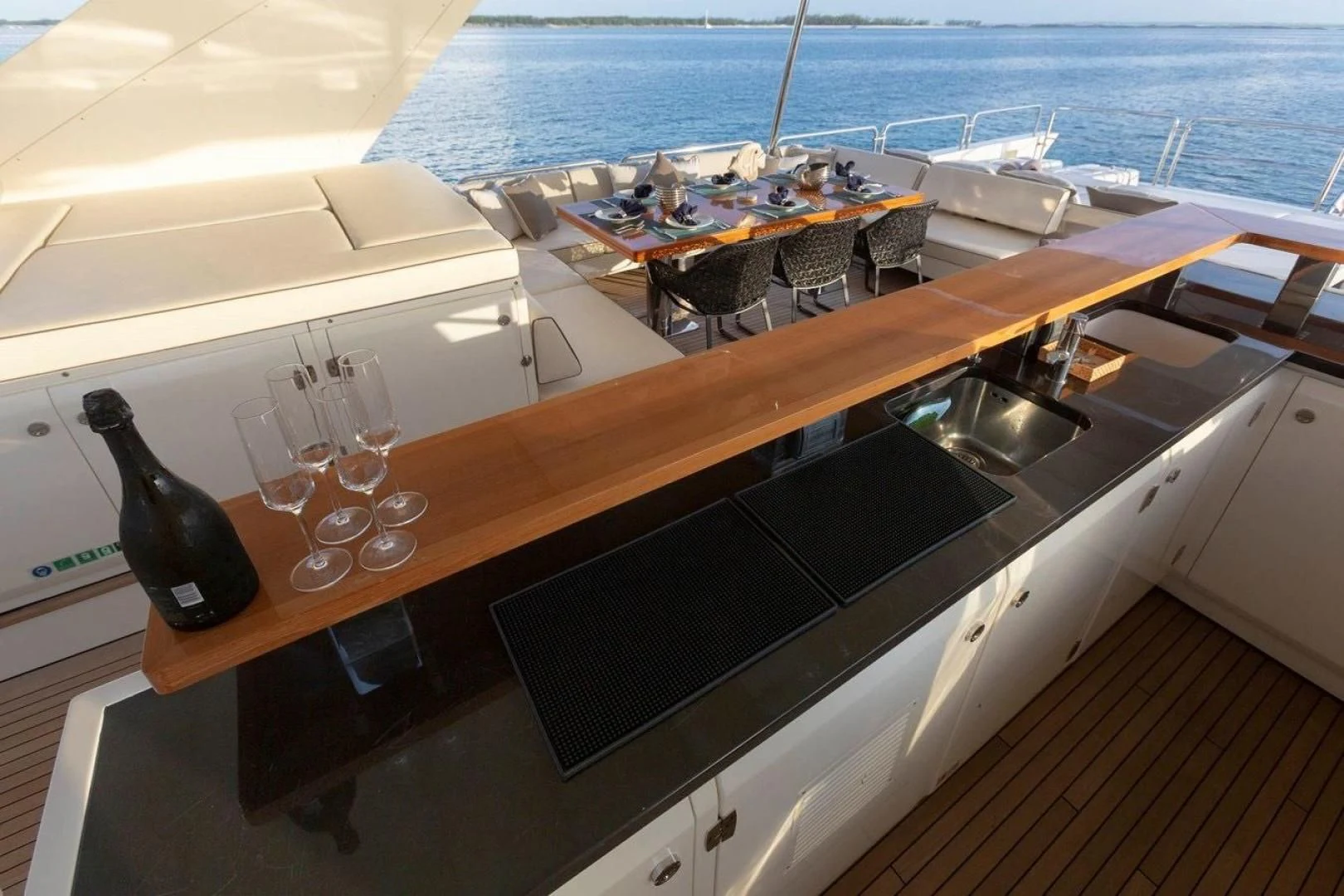 a black cat on a table aboard INSIEME Yacht for Sale