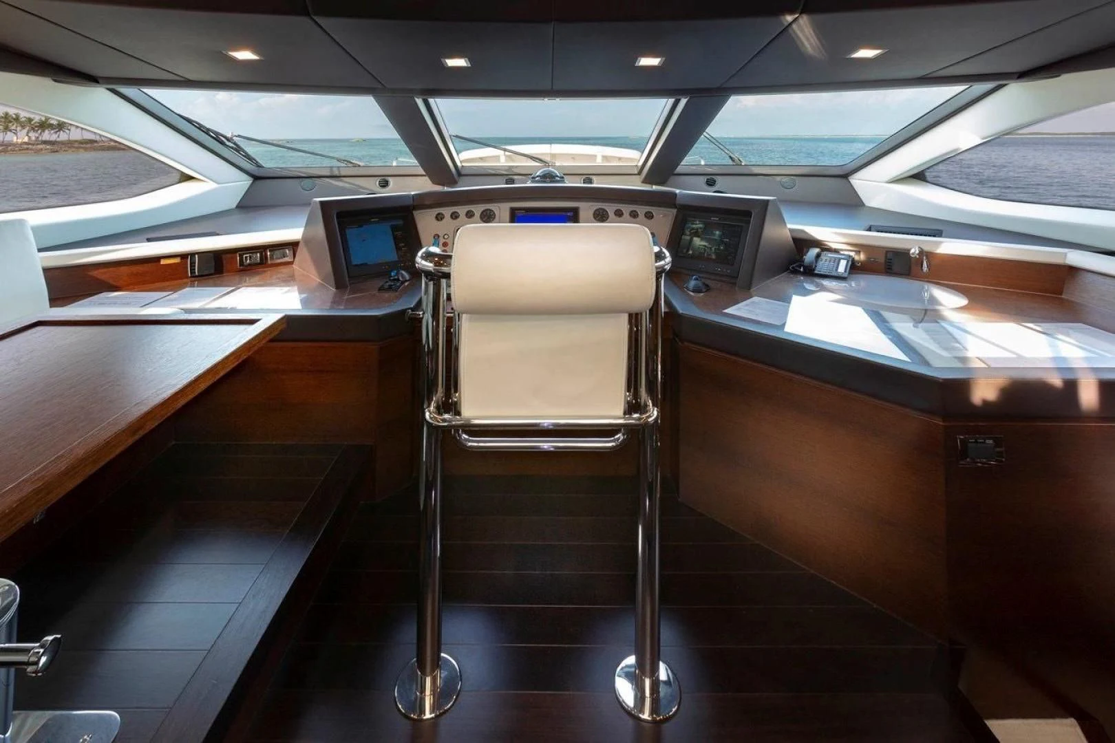 a chair in a vehicle aboard INSIEME Yacht for Sale