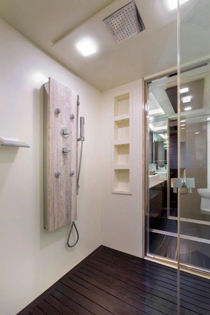a hallway with a glass door aboard INSIEME Yacht for Sale
