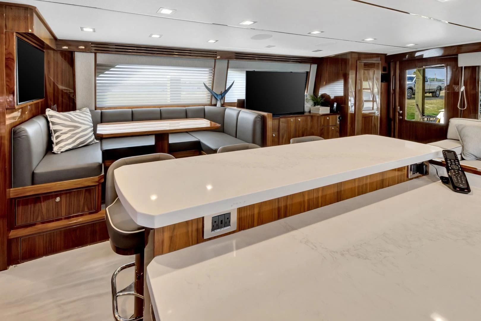 a large room with a bed and a couch aboard POZO SECO Yacht for Sale