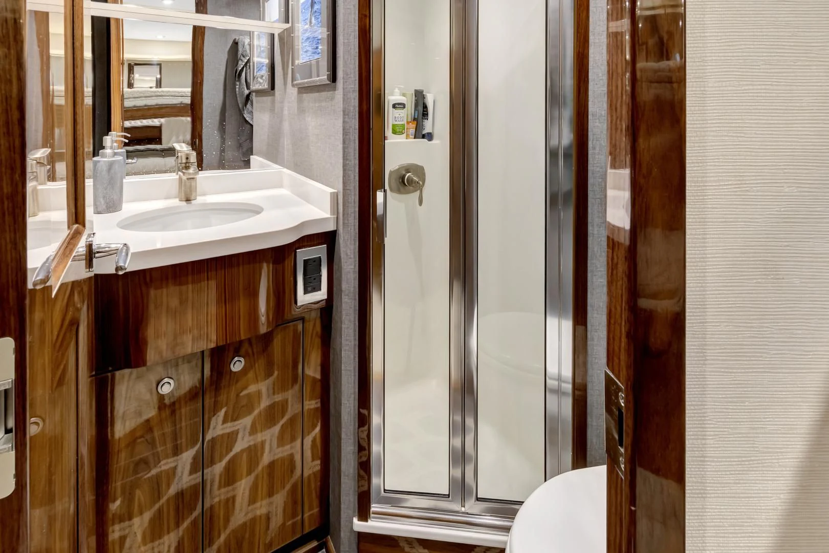 a bathroom with a sink and a mirror aboard POZO SECO Yacht for Sale