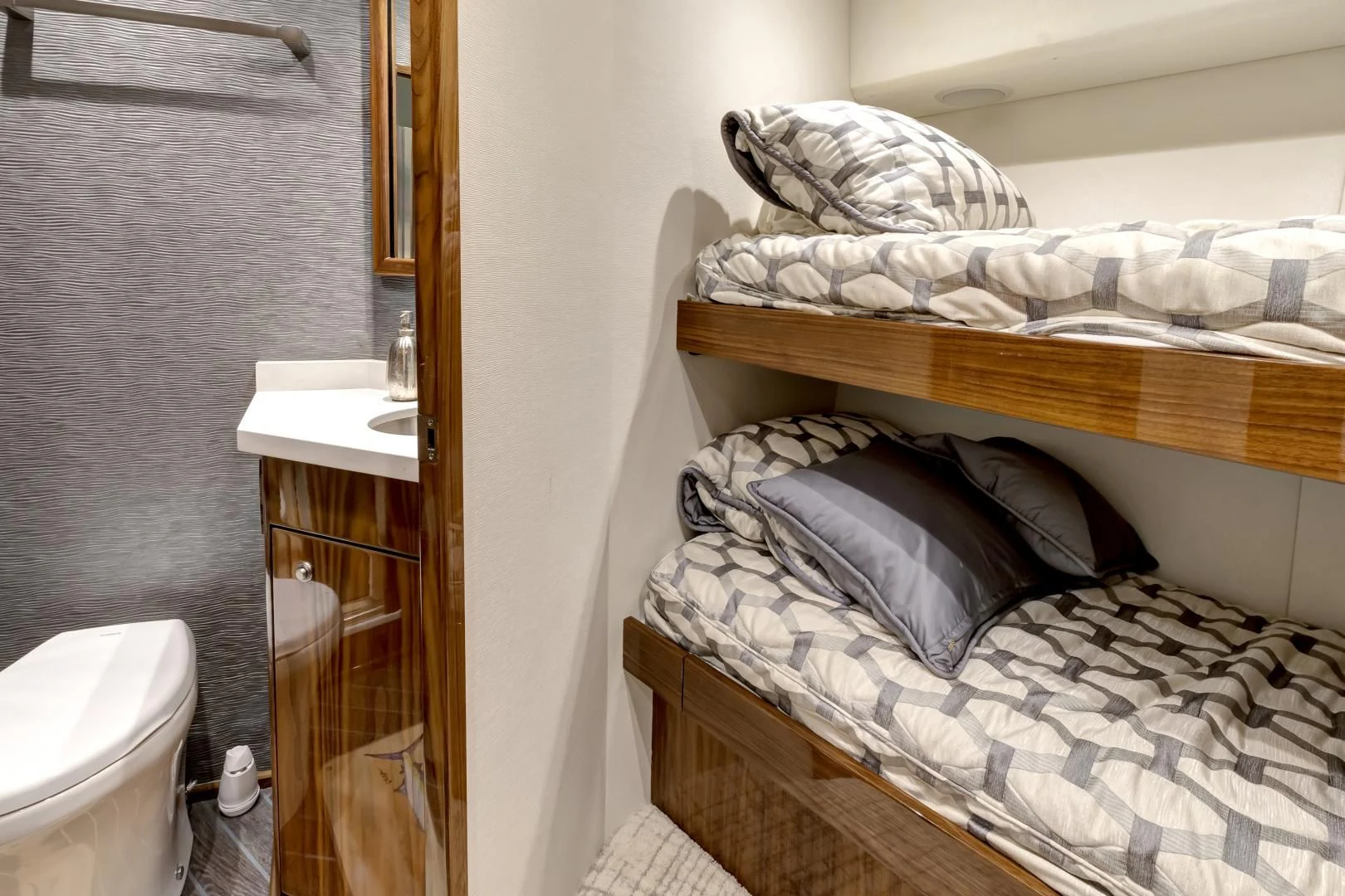 a small bedroom with a bed aboard POZO SECO Yacht for Sale