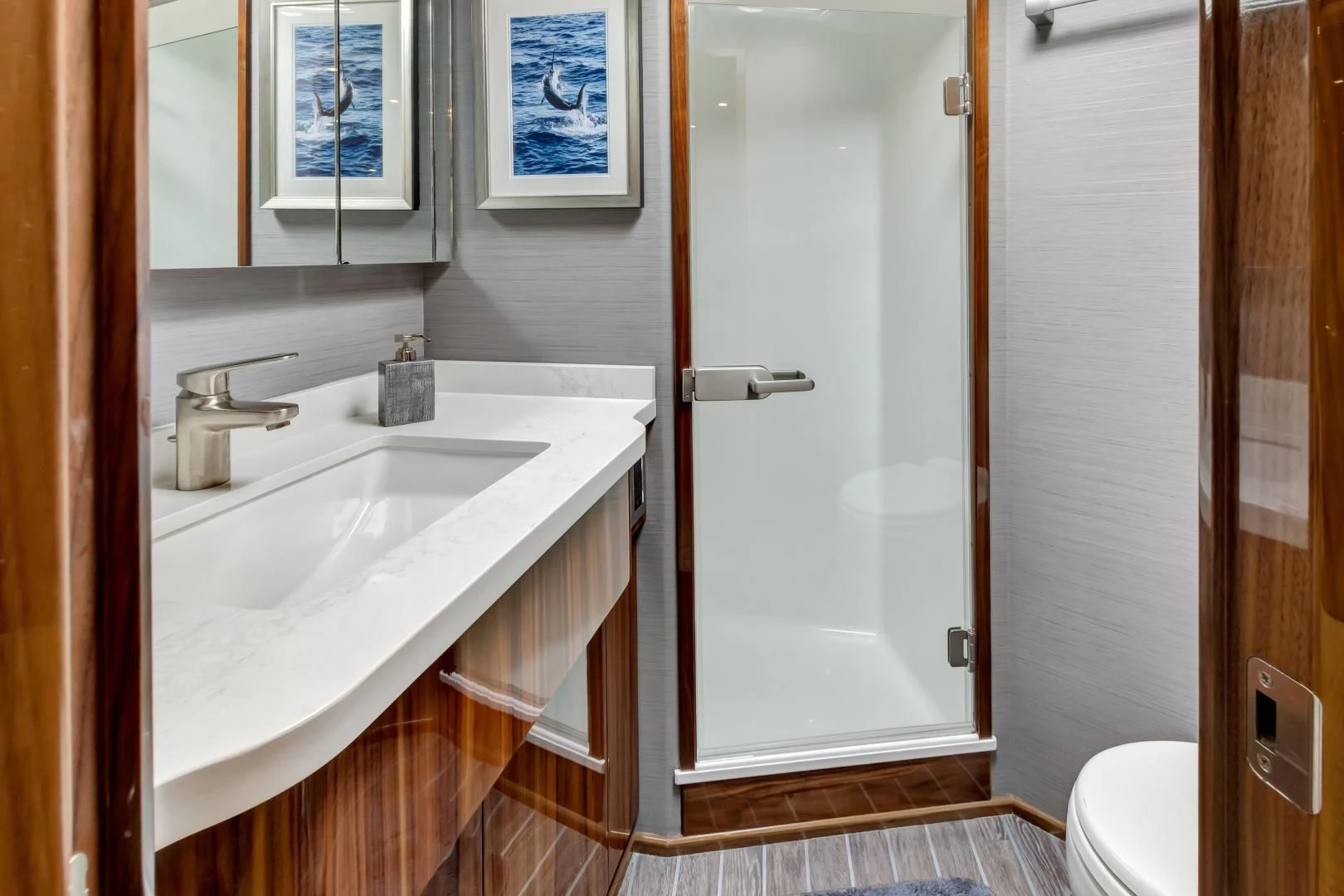 a bathroom with a sink and a toilet aboard POZO SECO Yacht for Sale