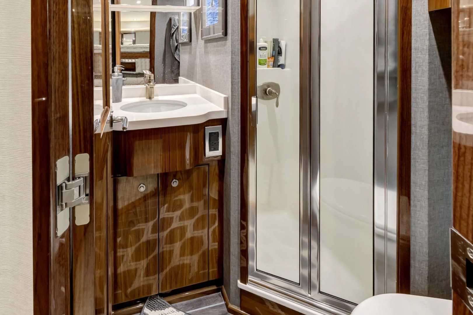 a bathroom with a sink and a shower aboard POZO SECO Yacht for Sale