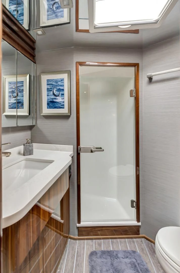 a bathroom with a sink and a toilet aboard POZO SECO Yacht for Sale