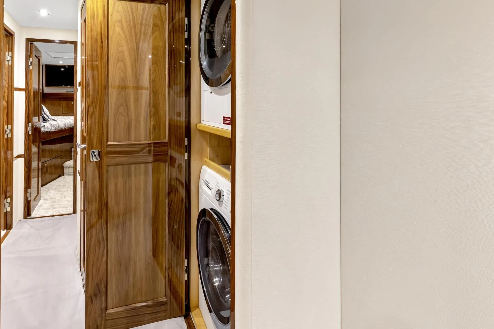 a closet with a door aboard POZO SECO Yacht for Sale