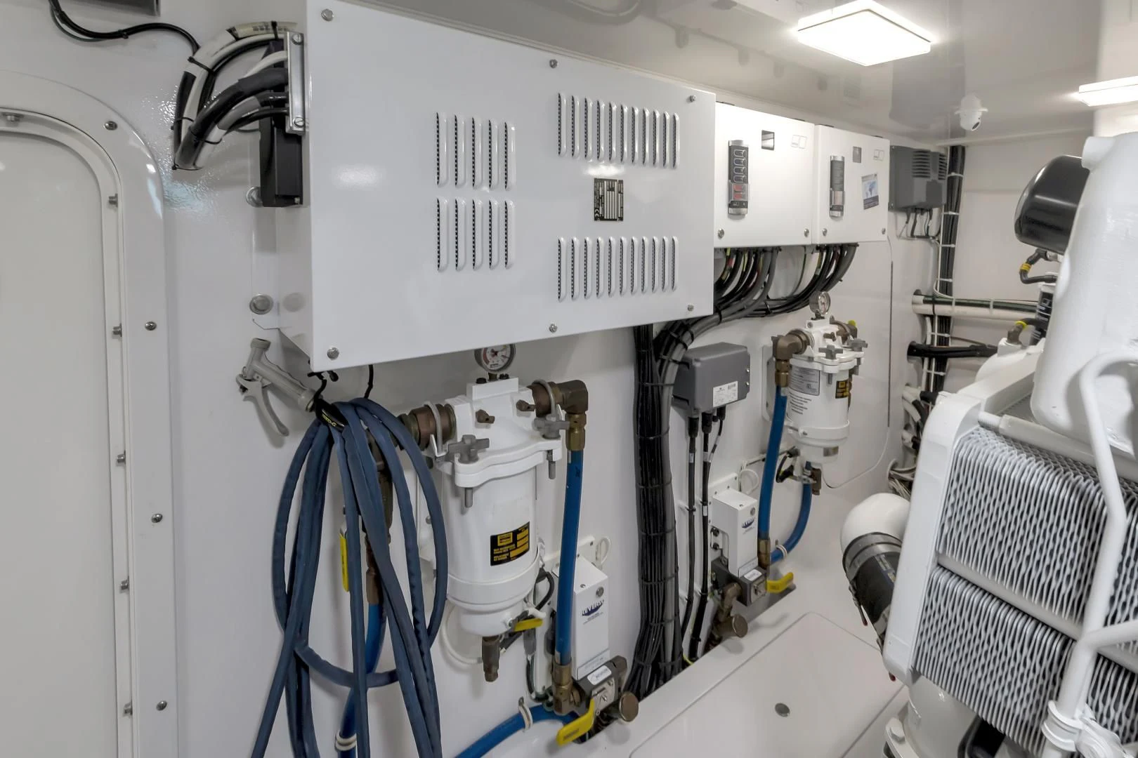 a room with white machines aboard POZO SECO Yacht for Sale