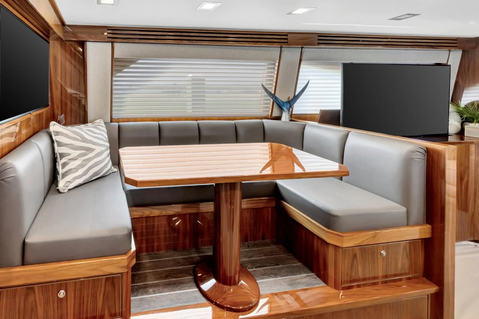 a living room with a couch and a tv aboard POZO SECO Yacht for Sale
