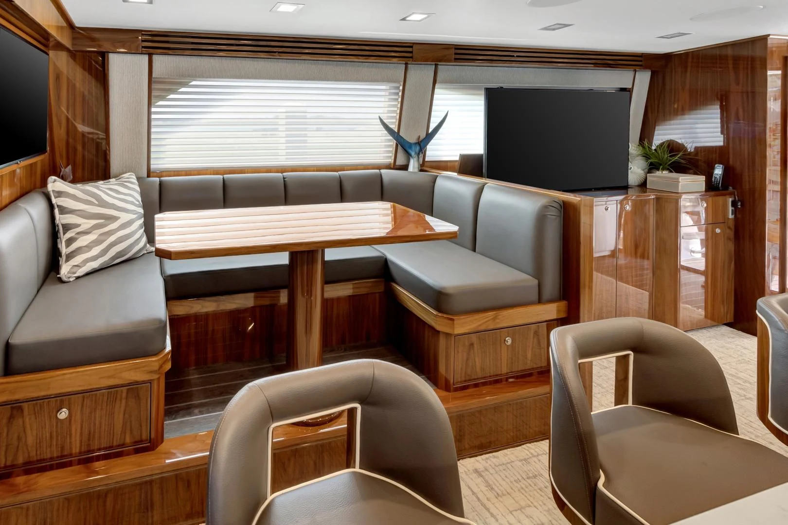 a living room with a couch and a tv aboard POZO SECO Yacht for Sale