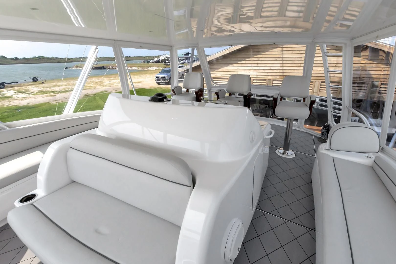 a room with a white table and chairs aboard POZO SECO Yacht for Sale